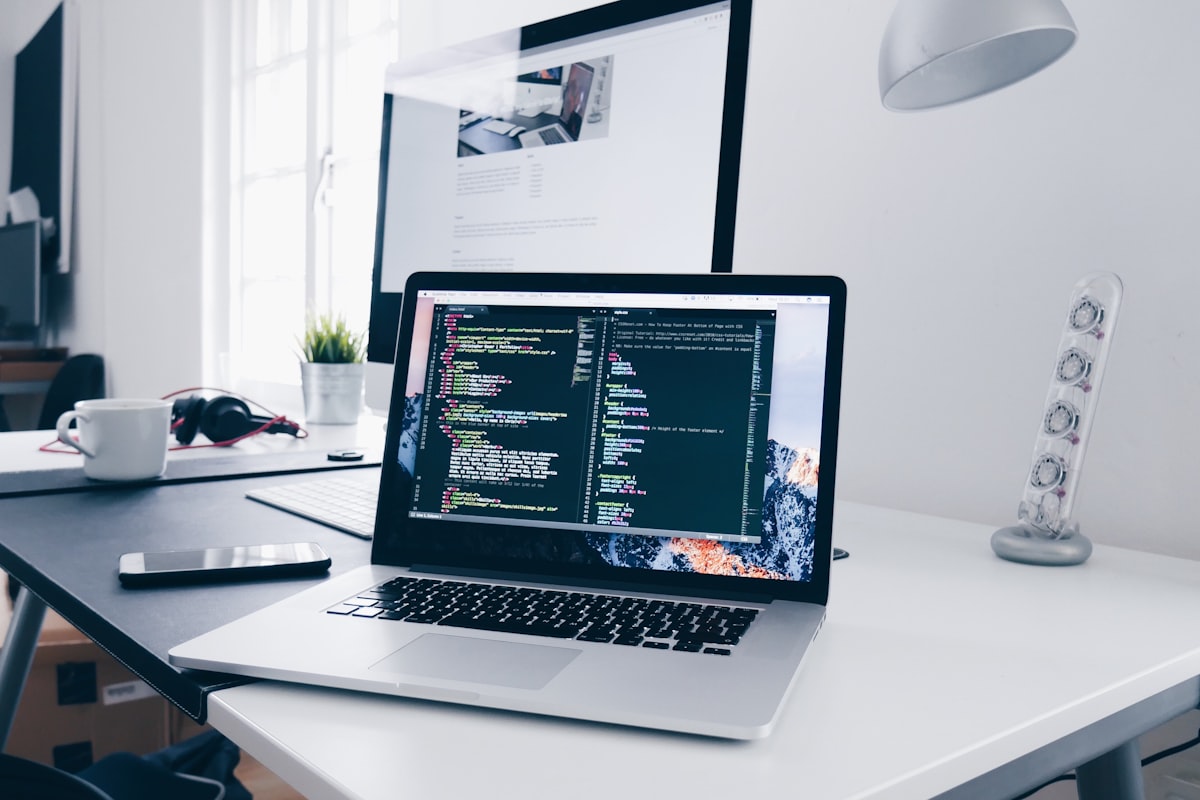 Monitor arm floating a display above a clean desk setup