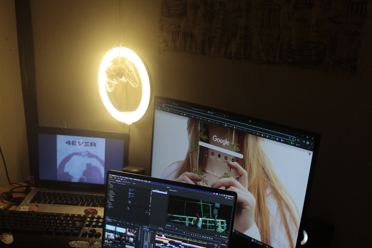 Walking pad under a standing desk with LED step counter display visible, dark home office setup